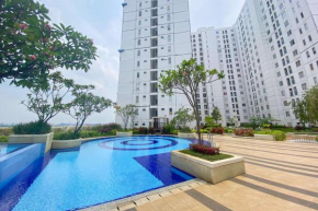 Best Strategic and Homey 2BR at Bassura City Apartment By Travelio